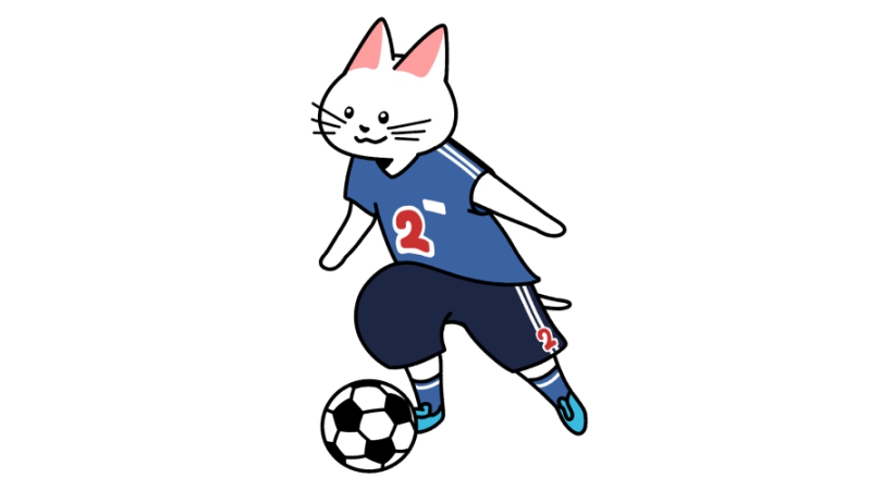 サッカーでドリブルをする猫のイラスト(ユニフォームあり)